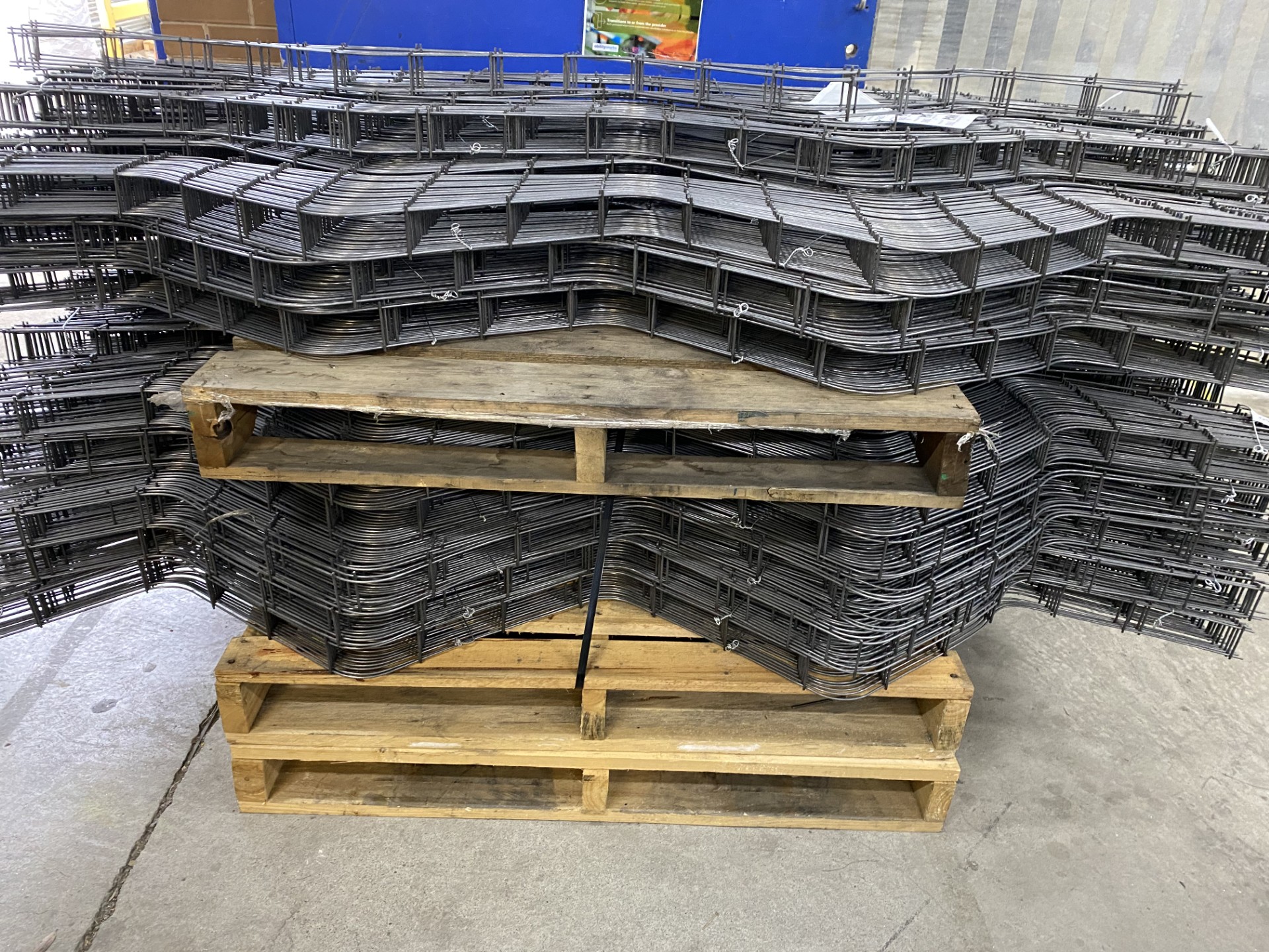 Packed snake mesh, wire packed together on pallets in a warehouse