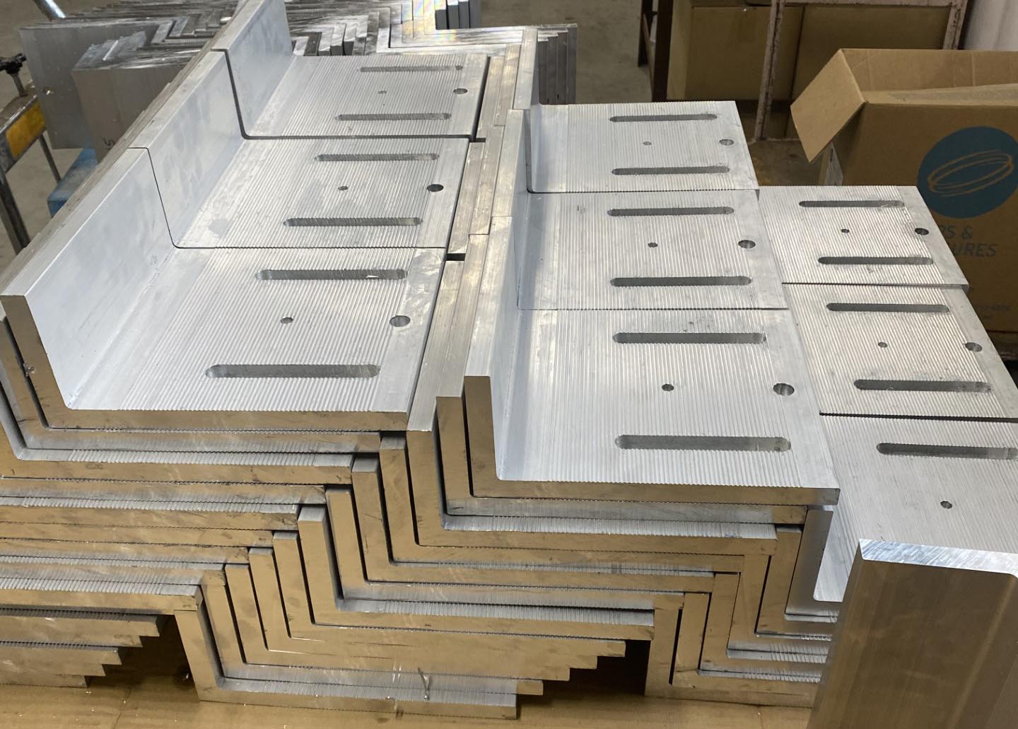 A stacked pile of window brackets