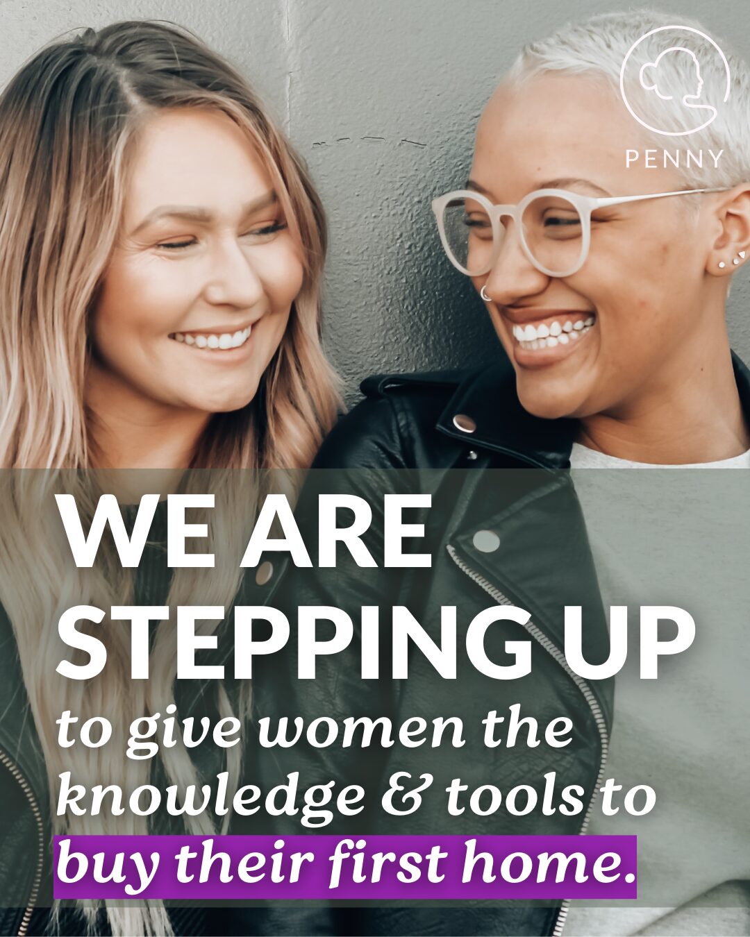 Two women sit closely together, smiling. One has long blonde hair, the other has short white hair and round glasses. Text over the bottom of the image reads 