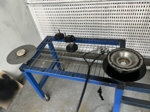 painting cooling fan clutch kits on a rack
